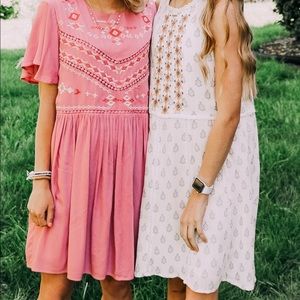 white dress on the right